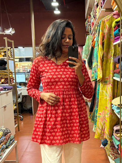 Ruby Bloom Peplum Top